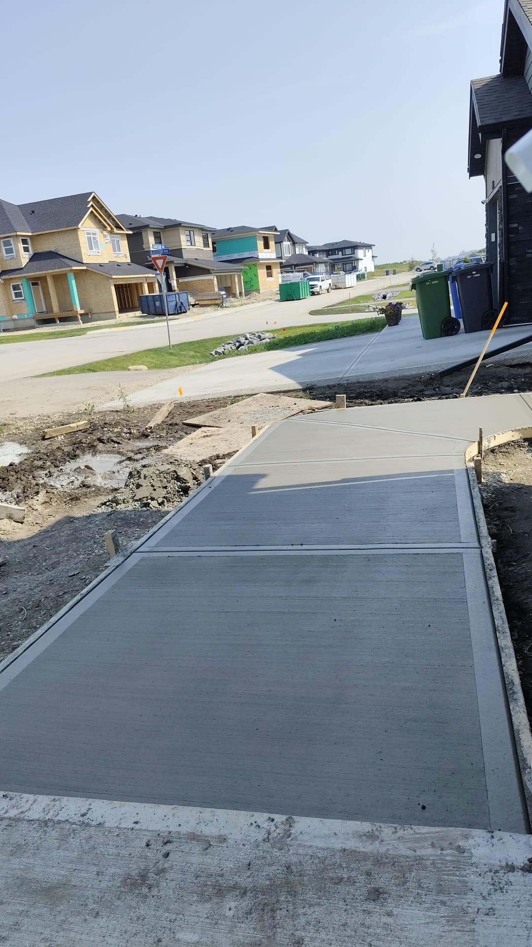 Front entrance broom finish concrete walkway Calgary