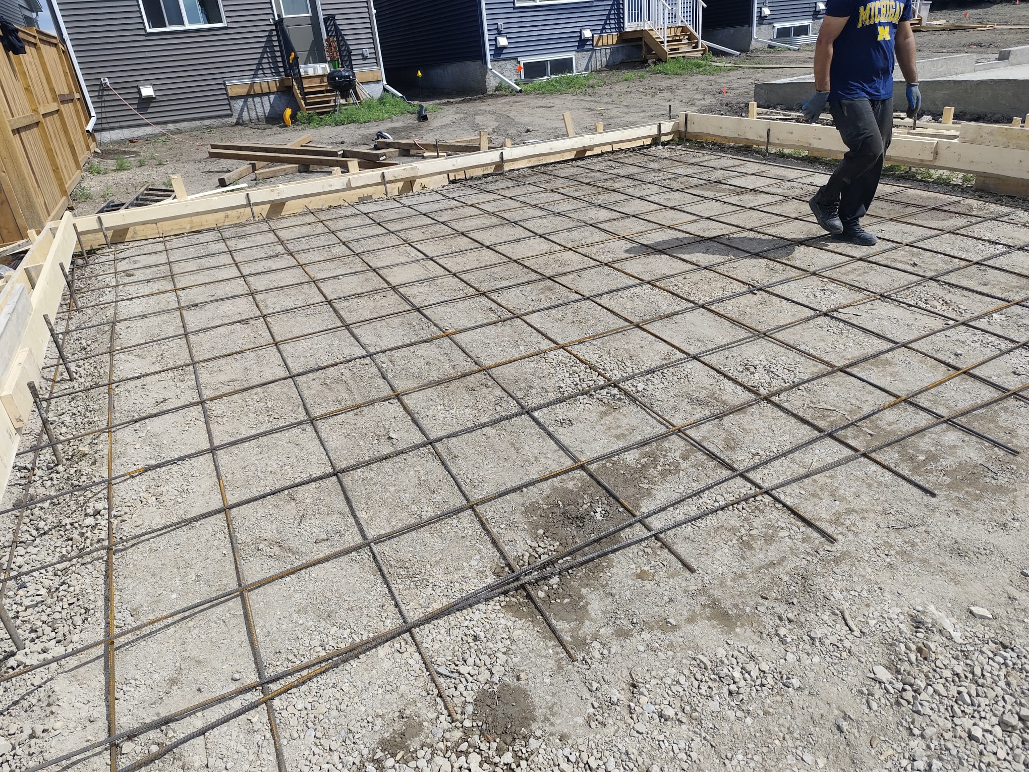 Concrete garage pad slab pour Calgary