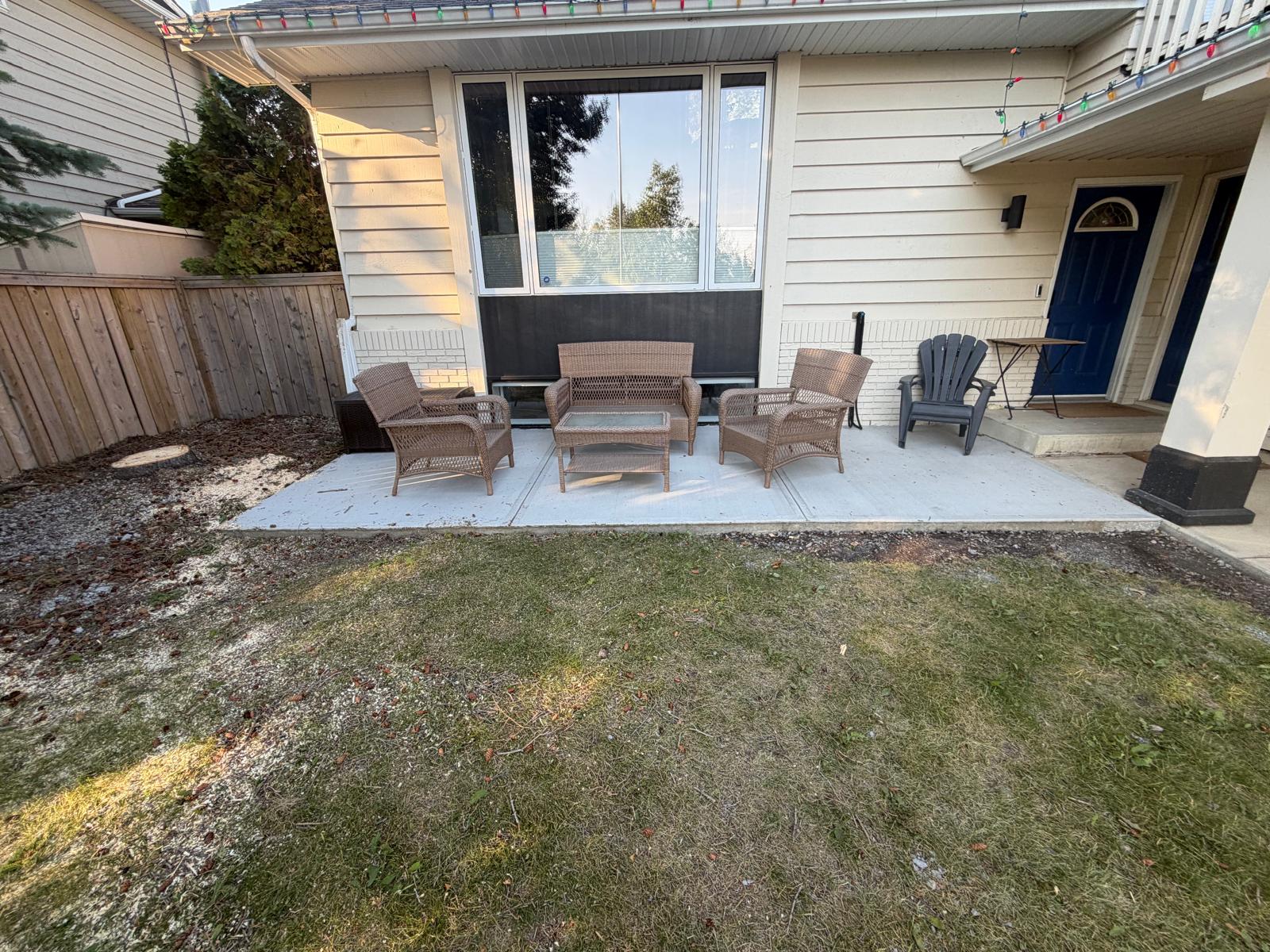 Custom front yard concrete patio installation Calgary