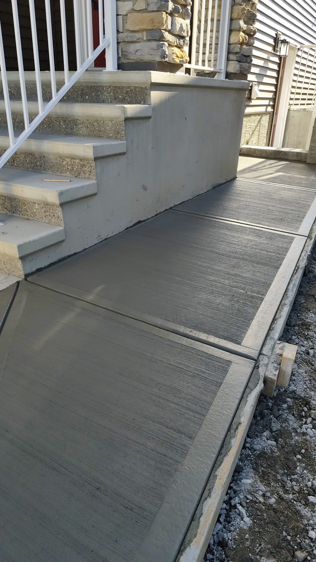 Side yard concrete sidewalk installation Calgary