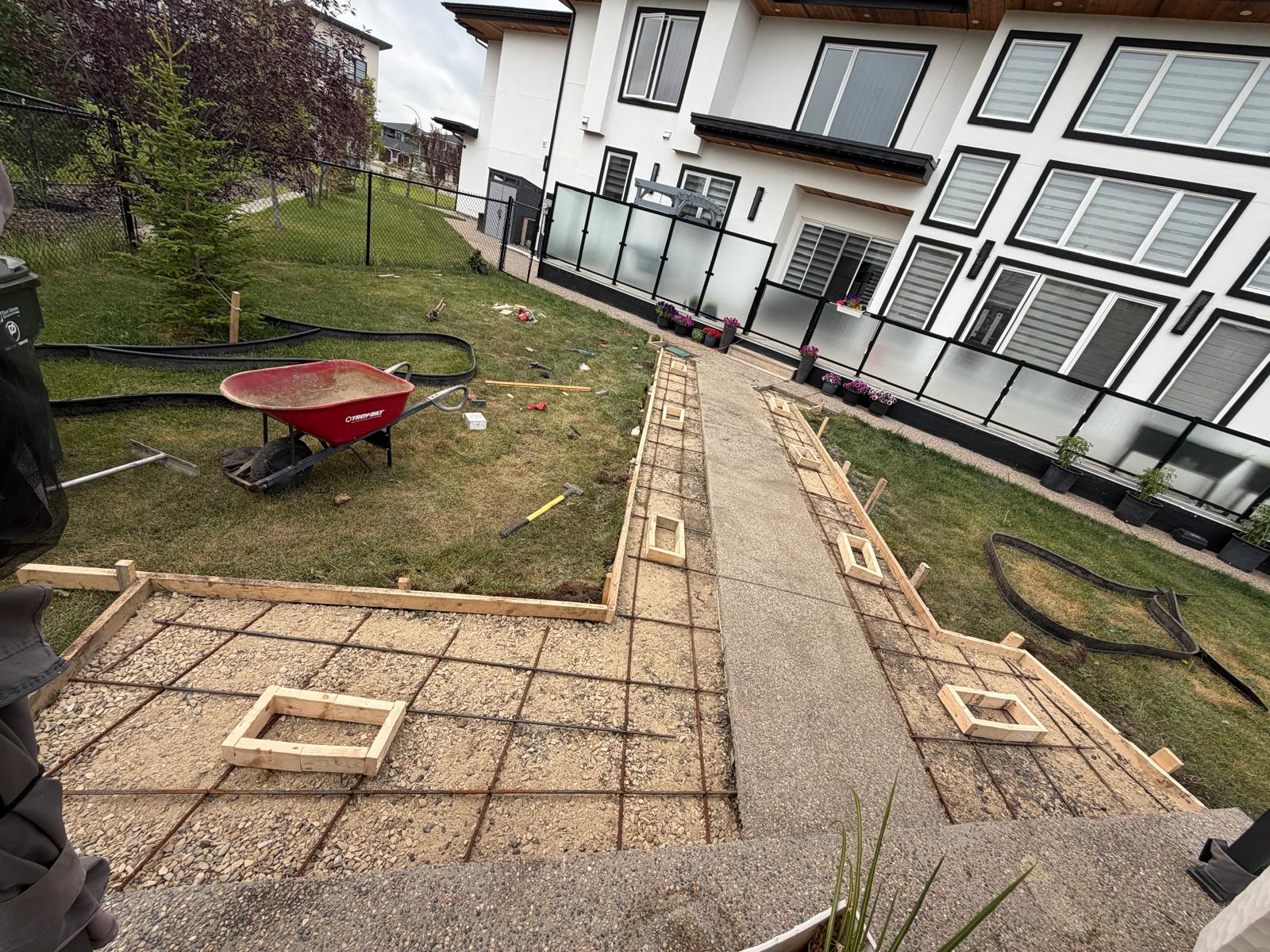Formwork and steel rebar grid for side walkway Calgary